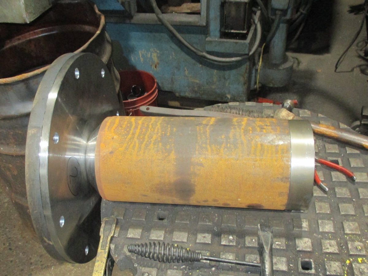 McLanahan log washer stub shaft, welded flange and hub before finish machining